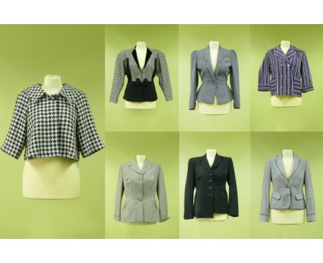 A collection of vintage and modern jackets and blazers in various sizes to include a houndstooth swing jacket, a John Collier