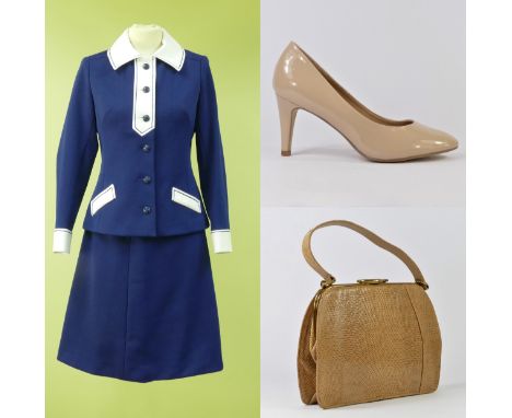 A two piece ladies suit, Harella, navy blue, single breasted, collared, long sleeve, with with fabric detailing, match pencil