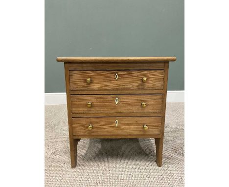 SMALL PITCH PINE CHEST OF THREE LONG DRAWERS, with brass knobs and side carry handles on side panel supports, 61.5cms H, 57cm