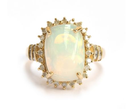 A 9ct gold, opal and diamond cluster ring, the Ethiopian Welo opal 4.6cts and 10x14mm, size P, gross weight 4.5g