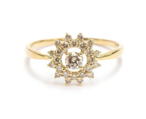 A 9ct gold starburst cluster ring set with Argyle diamonds totalling 0.5cts, size R 1/2, gross weight approx. 2g 