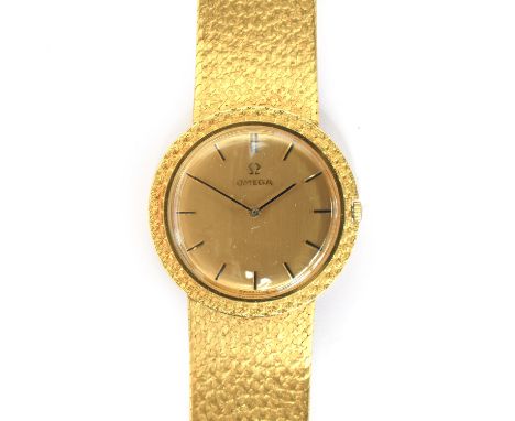 An Omega 18ct gold bracelet watch, cal.620 manual wind movement, 33mm diameter, gross weight 76g