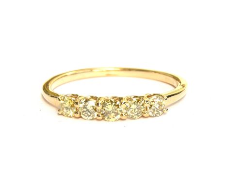 A 14ct gold ring set with five fancy olive coloured diamonds, total carat weight approx. 0.5cts, size P 1/2, 1.7g 