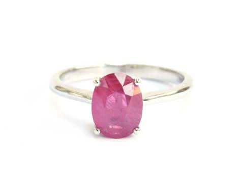 A platinum and ruby solitaire ring, the Burmese ruby 2.2cts and measuring 9x7mm, size P 1/2, gross weight 5g 
