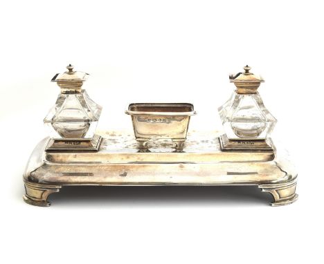 A Victorian silver ink stand by Henry Wilkinson &amp; Co, Sheffield 1845, with two cut class silver topped wells, 26.5cm wide