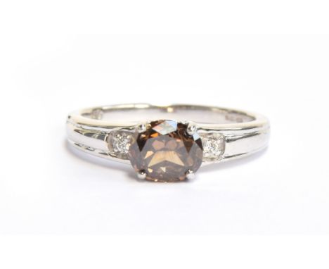 An 18ct white gold and Argyle brown diamond ring, size N 1/2,  gross weight 3.9g, purchased by the vendor in 2016 for £2800 