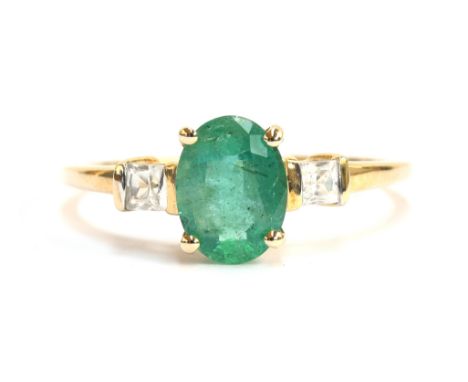 A 9ct gold, emerald and white zircon ring, the Zambian emerald 1.29cts and 8.2x6.2mm, the square cut natural white zircons to
