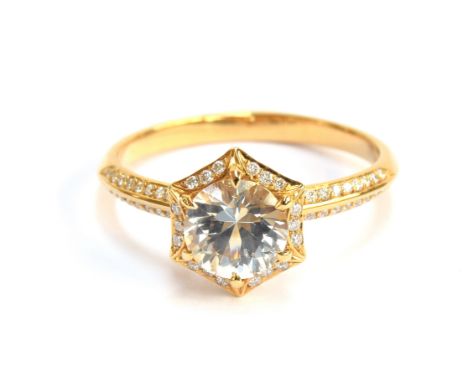 A Kat Florence 18ct gold, white sapphire and diamond hexagonal cluster ring, the Ceylon white sapphire 1.1cts and 6.5x6.5mm, 