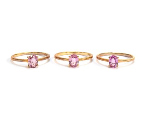 Three 9ct gold rings each set with a 1ct pink sapphire, size R 1.2, gross weight 5.2g
