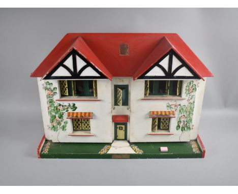 A Vintage Wooden Dolls House with Later Furniture, 61cms Wide 