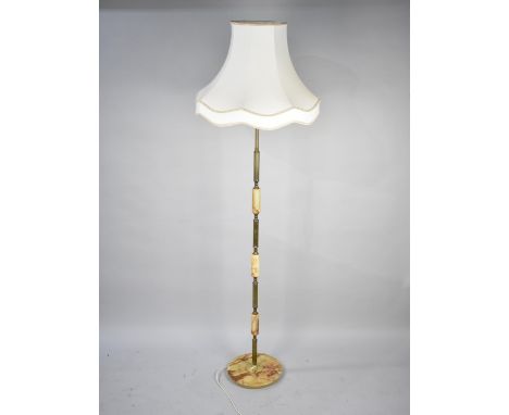 A Mid 20th Century Brass and Onyx Standard Lamp with Shade 