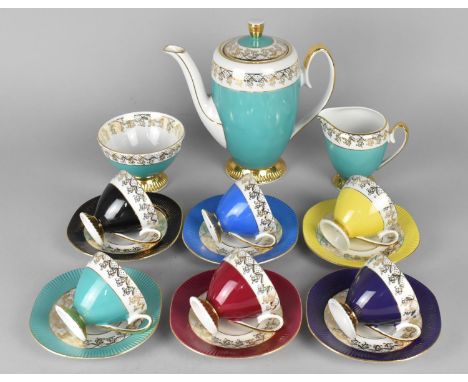 A Polish Porcelain Harlequin Coffee Set to Comprise Six Coffee Cans and Saucers, Coffee Pot, Milk Jug and a Sugar Bowl 