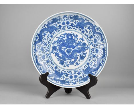 A Chinese Porcelain Blue and White Charger with Dragon Decoration, 31cm Diameter, Seal Mark to Base, with Stand, Some conditi