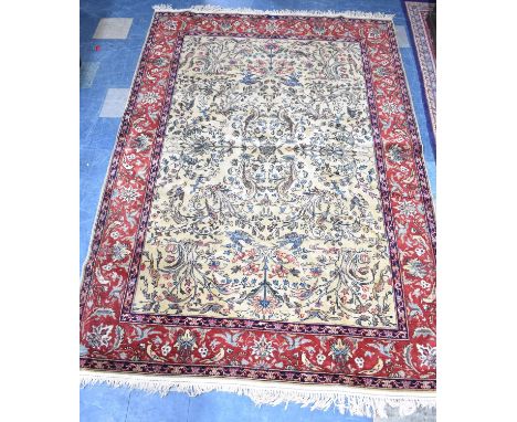 A Large Vintage Patterned Carpet, Fawn Ground, 306x212cm 