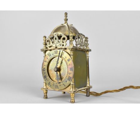 A Reproduction Brass Lantern Clock with electric Movement, 18cms High 