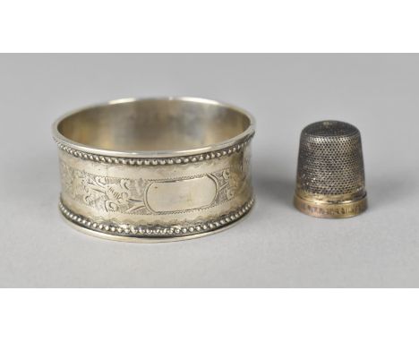 A Silver Napkin Ring by HB, Birmingham Hallmark 1892 Together with a Sterling Silver Thimble 