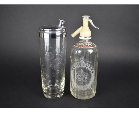 A Vintage Schweppes Soda Syphon and a Silver Plate Topped Etched Glass Cocktail Shaker, 28.5cms High 