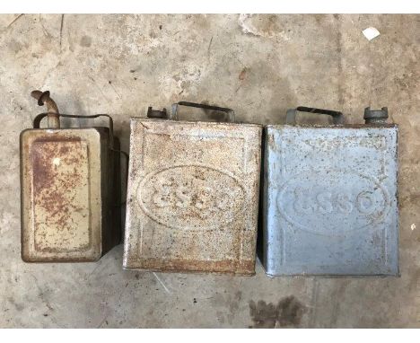 Two Esso two gallon petrol cans and one smaller. 