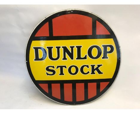 A Dunlop Stock circular enamel sign in near mint condition, new old stock, 24" diameter.