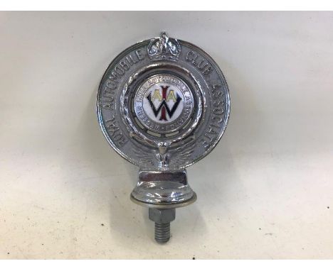 A Royal Automobile Club Associate car badge with Western India Automobile Association part enamel centre.
