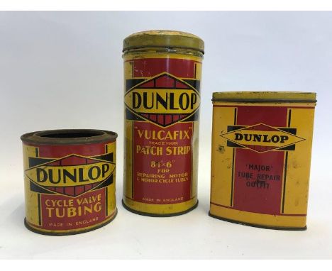 A Dunlop Vulcafix Patch Strip cylindrical tin,  a Dunlop Cycle Valve Tubing tin lacking lid and a Dunlop Major Tube Repair Ou