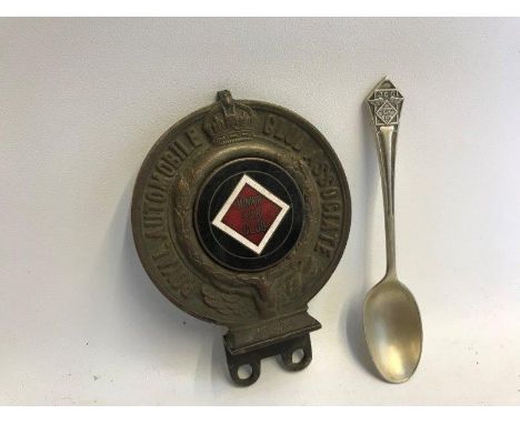 A Royal Automobile Club Associate car badge with Junior Car Club enamel centre, with celluloid backing for 1930, no. JL24; al