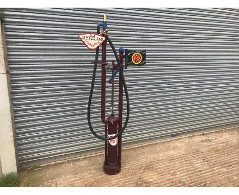 A Wayne model 1420 skeleton petrol pump with modern cast aluminium brand plaques.