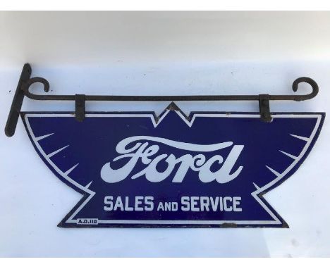 A rare and early Ford Sales and Service shaped double sided enamel sign on metal hanging bracket, marked AD 110, 30x 12" (mea
