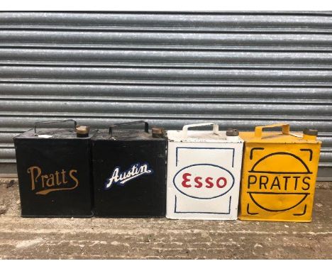 Four 2-gallon petrol cans including Pratts and Esso. 