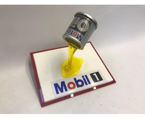 A Mobil 1 'pouring oil from the tin' display.