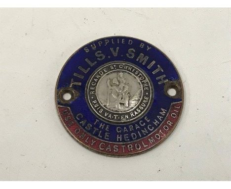 An enamel dealership supply plate for Tills. V. Smith, The Garage, Castle Headingham, with central St. Christopher badge. 