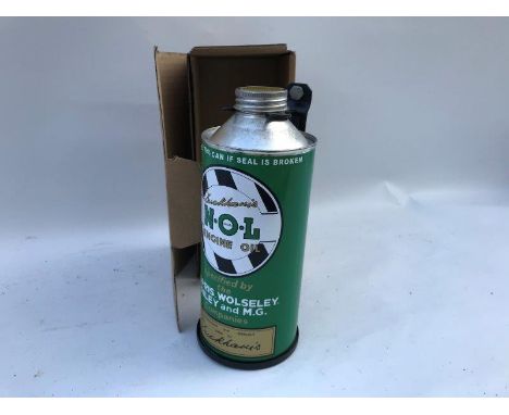 A reproduction Duckham's NOL cylindrical quart oil tin on bulkhead bracket. 