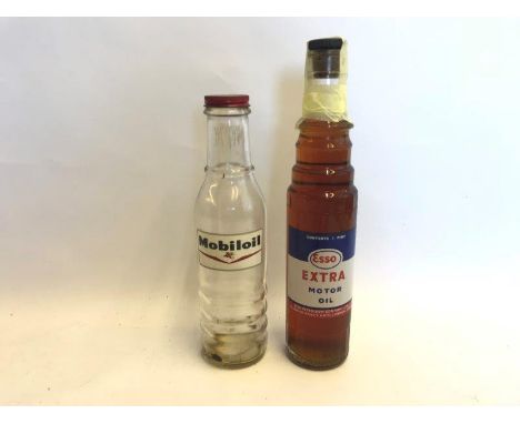 An Esso Extra Motor Oil pint bottle and a Mobiloil glass oil bottle with BBSAE50 cap. 