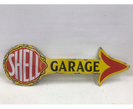 A rare and early Shell Garage enamel double sided arrow with some restoration, 35 3/4 x 12". 