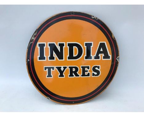 An India Tyres circular enamel sign, 18" diameter.