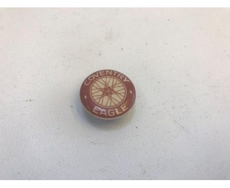 A Coventry Eagle button.