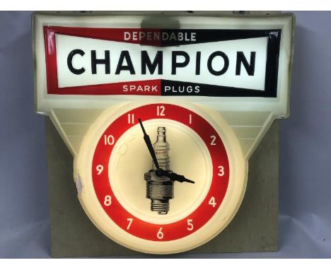 A rare Champion Dependable Spark Plugs shaped perspex showroom illuminated clock/lightbox, 25 x 23 1/2".