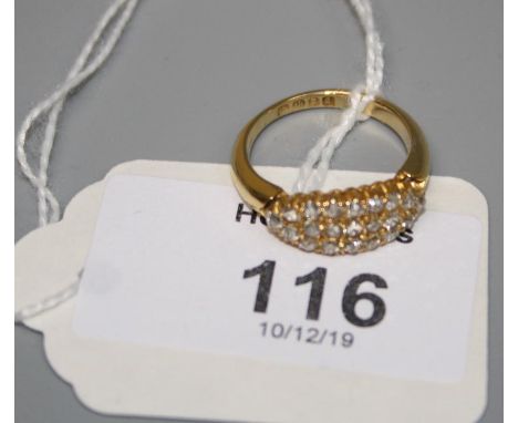 A three row diamond ring,  the old brilliant cut diamonds pavé set to tapered shoulders,k 18ct gold shank, Ring size M, 4.2g