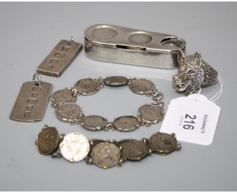 Tiffany, an unusual coffin-shaped money holder, with three graduated apertures, the base stamped 'Tiffany Co makers sterling'