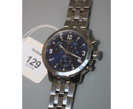 A Tissot 1853 gentleman's wristwatch, the circular blued dial with Arabic and baton numerals, three subsidiary dials, and out