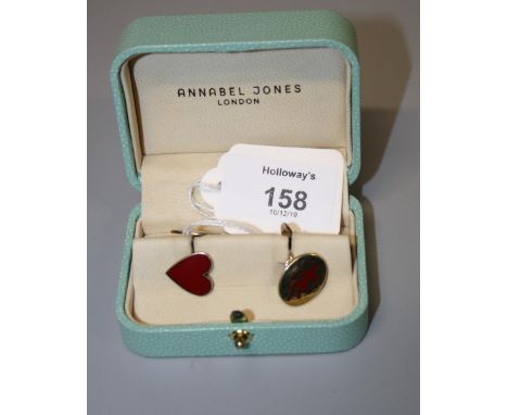Deakin and Francis for Annabel Jones. A pair of silver gilt and enamel cufflinks, one plaque with red enamel heart, the oppos
