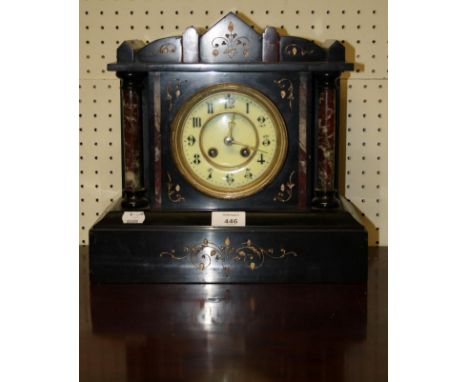 A late Victorian black marble 8 day mantel clock, of architectural form, 32cm wide