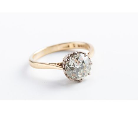 A single stone diamond ring, the old brilliant cut diamond in eight claw mount, to plain 18ct gold shank Approximately 1.85 c