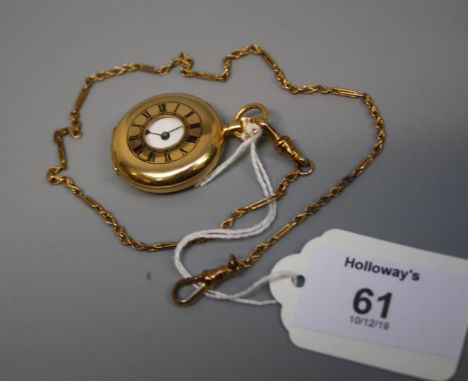 A lady's Swiss 18ct gold half hunting cased watch,  with enamelled outer chapter ring, white enamel dial, Roman numerals, key