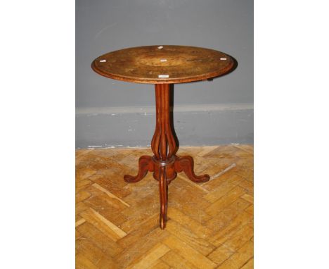 A Victorian walnut and marquetry oval top table with open work column and tripod base, 61cm wide