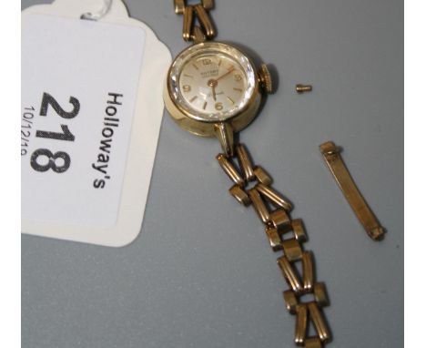 A lady's 9ct gold Rotary wristwatch, the circular champagne dial with baton numerals, fancy link 9ct gold bracelet strap Gros
