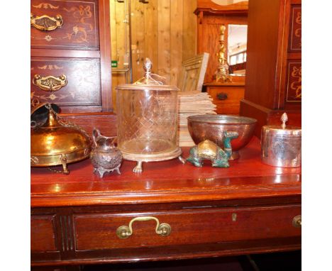 A silver plated and glass biscuit barrel, having pineapple knop and cut detail, raised on paw feet together with an Indo-Pers