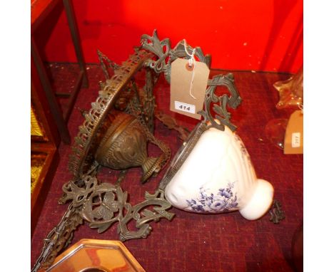 An early 20th century brass and porcelain hanging light 