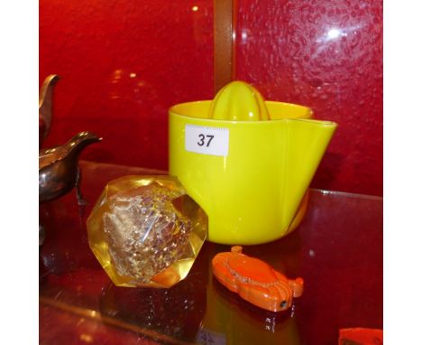 A Royal Copenhagen retro lemon juicer together with a vintage crab form lighter and a vintage resin paperweight 