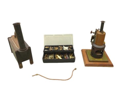 Two steam engines, one marked 'S S' and the other unmarked, together with a box of miniature brass valves and a gauge, larges
